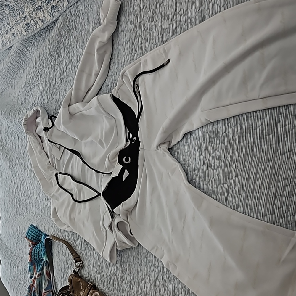 2 piece jogger new with tags.top has hood size s.bottom has is a med